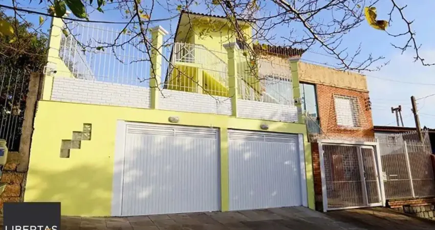 Casa com 2 quartos à venda na Avenida Nonoai, 108, Nonoai, Porto Alegre