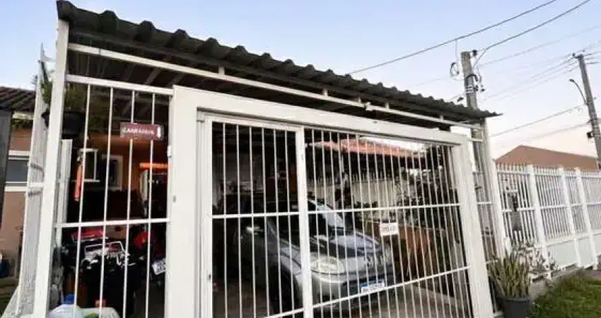 Casa com 2 quartos à venda na Rua Coronel Dastro Dutra, 277, Restinga, Porto Alegre