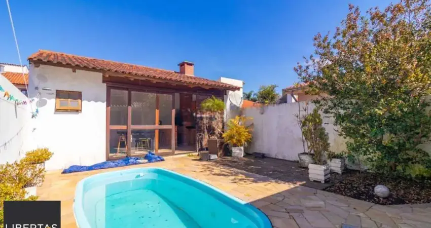 Casa com 3 quartos para alugar na Rua Rodolpho Espinoza, 70, Hípica, Porto Alegre