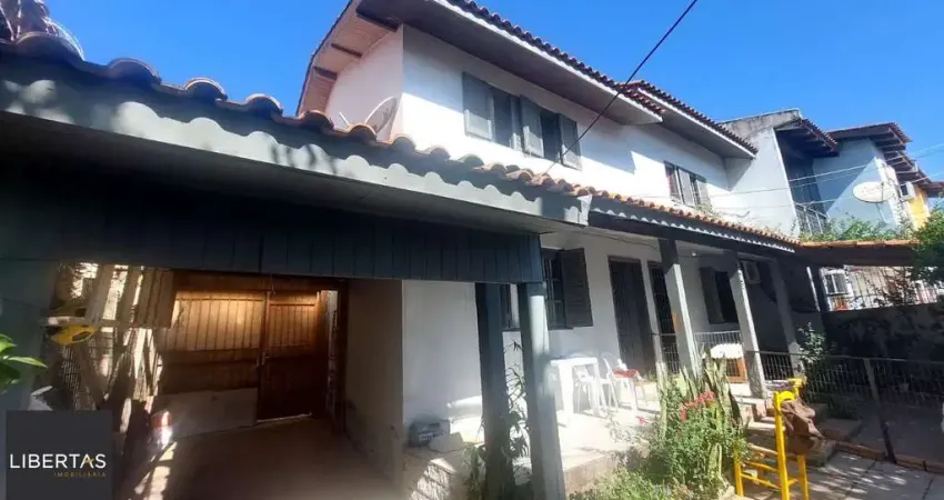 Casa com 4 quartos à venda na Rua Hermínio Leal de Albuquerque, 1005, Parque Santa Fé, Porto Alegre