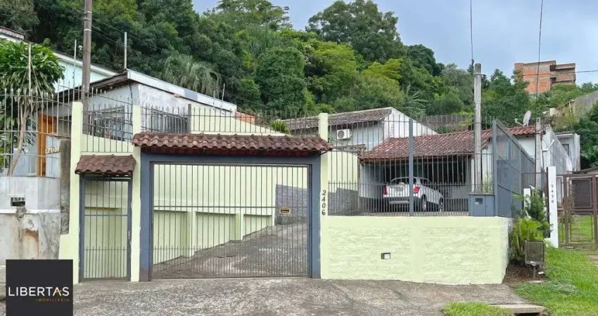 Casa com 3 quartos à venda na Avenida Vicente Monteggia, 2406, Vila Nova, Porto Alegre