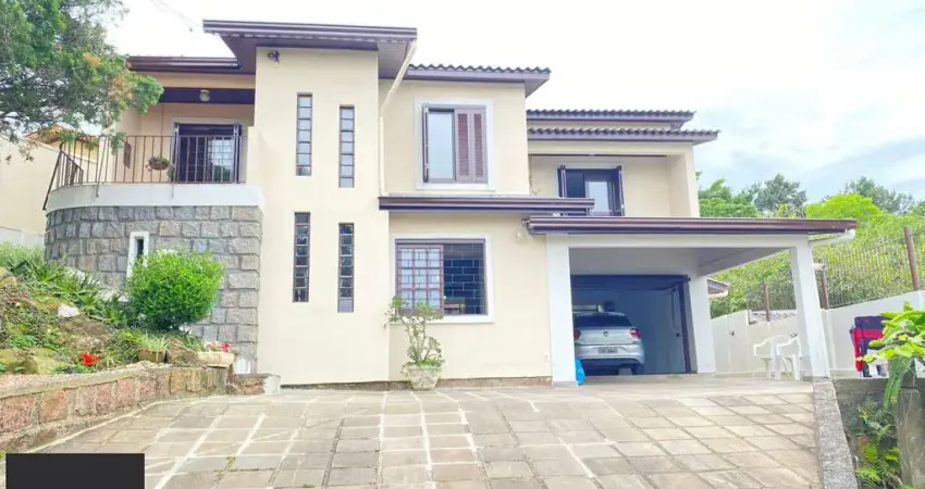 Casa com 3 quartos à venda na Acesso Hélio Alves da Rocha, 175, Vila Nova, Porto Alegre