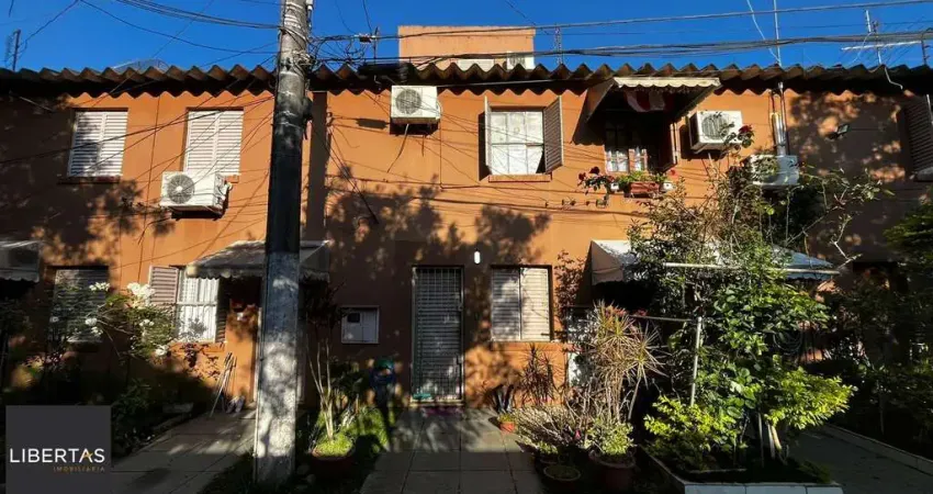 Casa em condomínio fechado com 3 quartos à venda na Rua Mura, 356, Guarujá, Porto Alegre