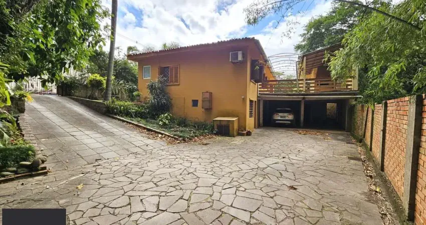 Casa com 4 quartos à venda na Rua Professor Carvalho Freitas, 1460, Teresópolis, Porto Alegre