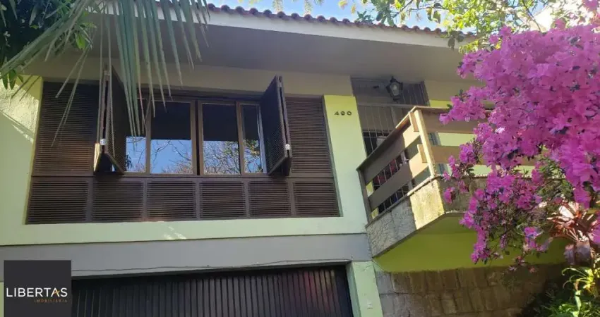Casa com 5 quartos à venda na Rua Fernando Osório, 490, Teresópolis, Porto Alegre