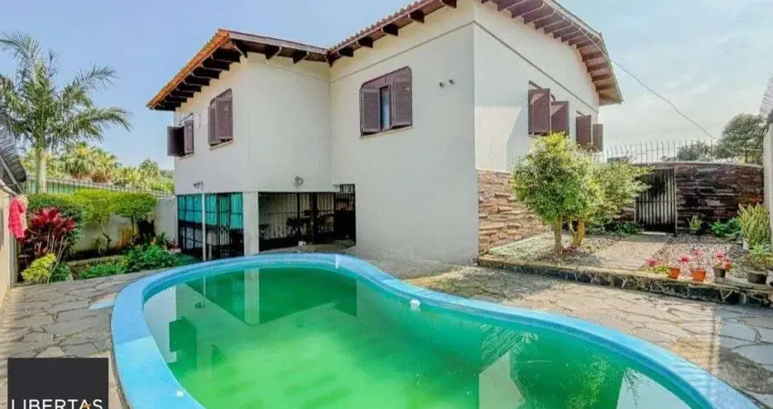 Casa com 3 quartos à venda na Avenida Clemenciano Barnasque, 219, Teresópolis, Porto Alegre