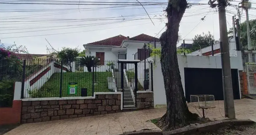 Casa com 3 quartos à venda na Rua Tobias Barreto, 408, Partenon, Porto Alegre
