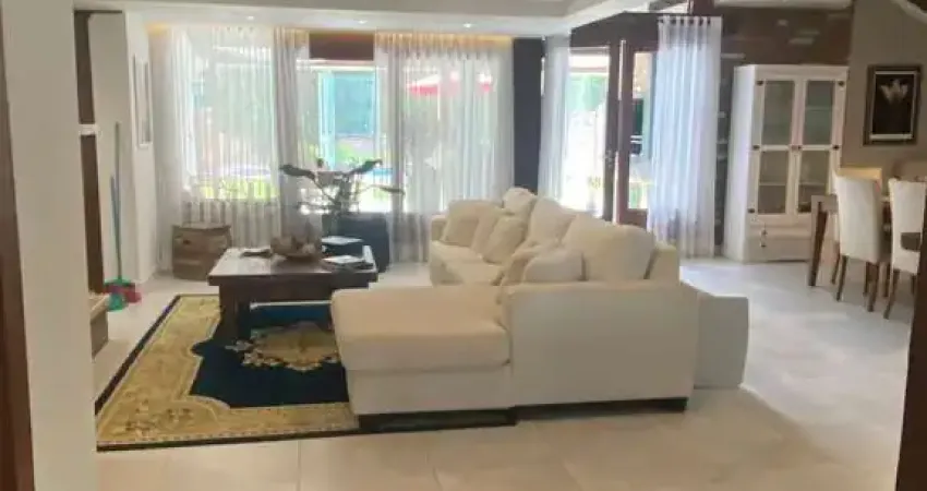 Casa 4 suites no Terra Ville, com gabinete, 4 vagas e piscina.