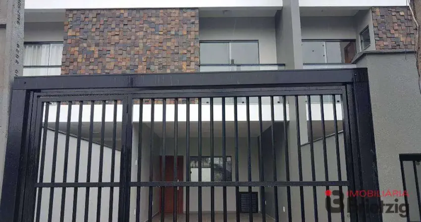 Casa com 3 dormitórios à venda, 128 m² por R$ 650.000,00 - Itaum - Joinville/SC