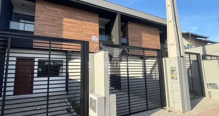 Sobrado Geminado no Bairro Adhemar Garcia com Suíte