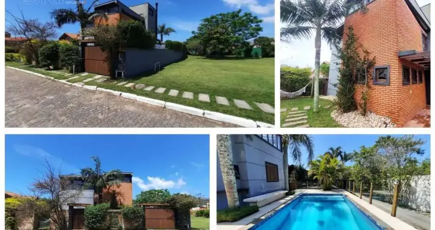 Casa 3 suítes em condomínio fechado a venda por r$ 3.990.000 com 450 m²