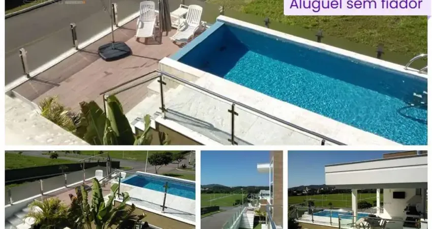 Casa 4 suítes e 6 banheiros para alugar, 560 m² por r$ 23.000/mês