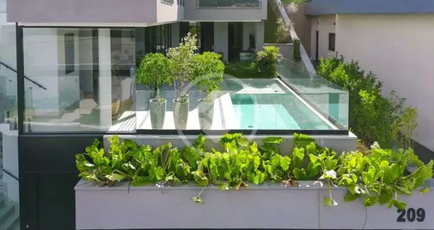 Linda casa em condomínio fechado, 448m2, 4 suítes, 3 vagas, alphaville. codigo: 142856