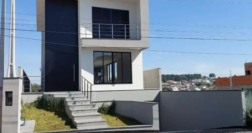 Casa no condomínio arujazinho iv com 3 suítes e piscina - arujá