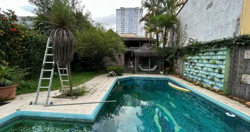 Casa á venda com 360m², 3 suítes, 5 vagas, piscina, vila rosália guarulhos.