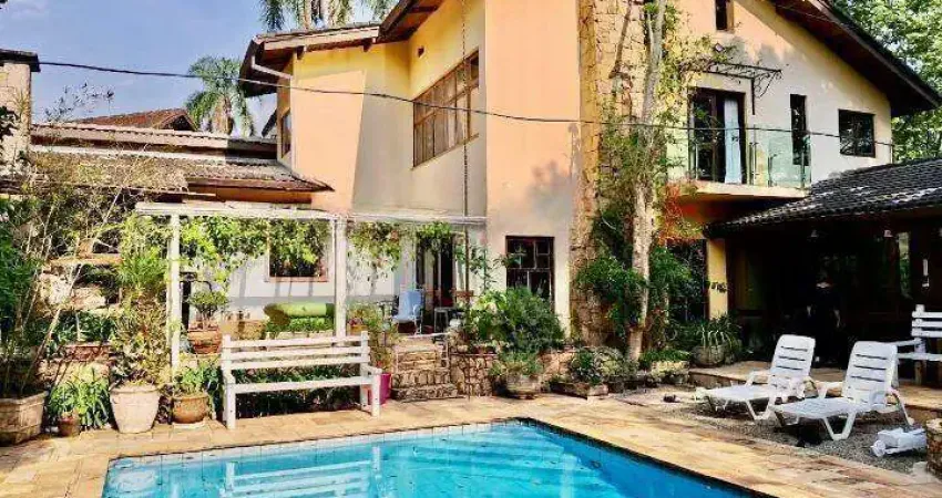 Casa em condomínio à venda em Mairiporã – 4 suítes, 393 m², lazer completo