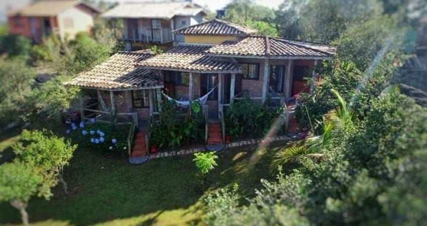 Descubra sua pousada dos sonhos em Ibiraquera - Imbituba! 4 suítes, 170m², por R$2.000.000. Venha conhecer!