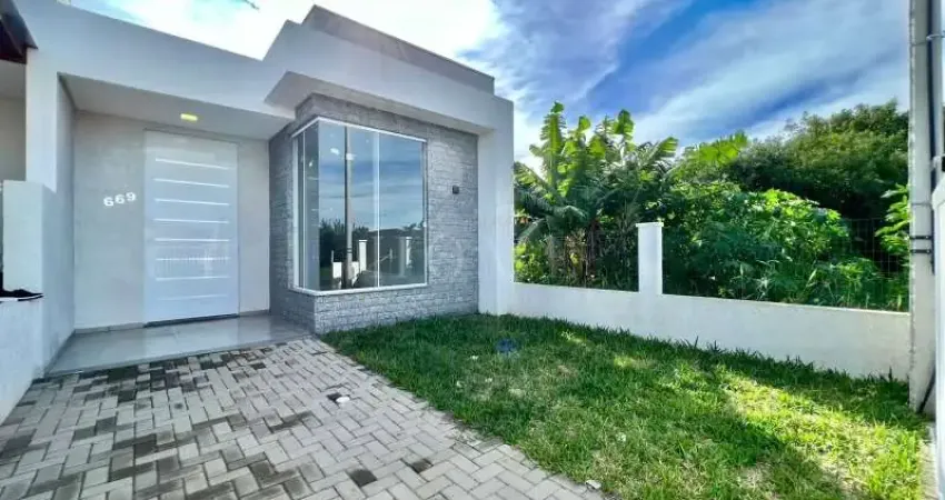 CASA COM 2 DORMITORIOS, SENDO 1 SUITE BEM LOCALIZADO!