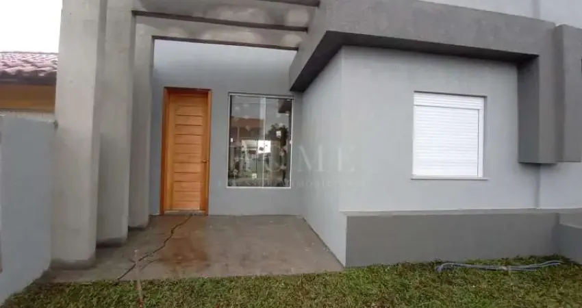 CASA COM 2 DORMITORIOS, SENDO 1 SUITE BEM LOCALIZADA!