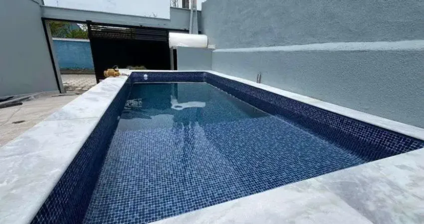Casa com piscina, 3 quartos e área gourmet em Itanhaém.
