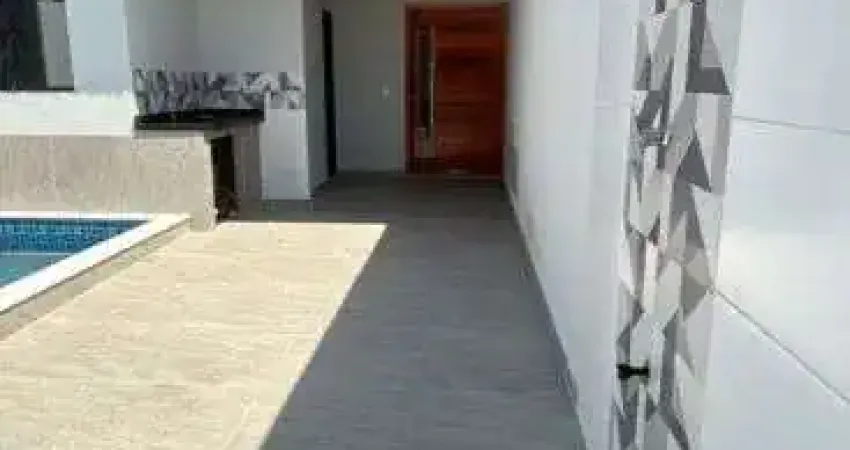 Casa com 3 quartos, piscina e área gourmet em Itanhaém.