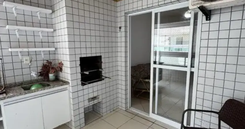 Apartamento à 150m do mar com piscina e área gourmet em Praia Grande.