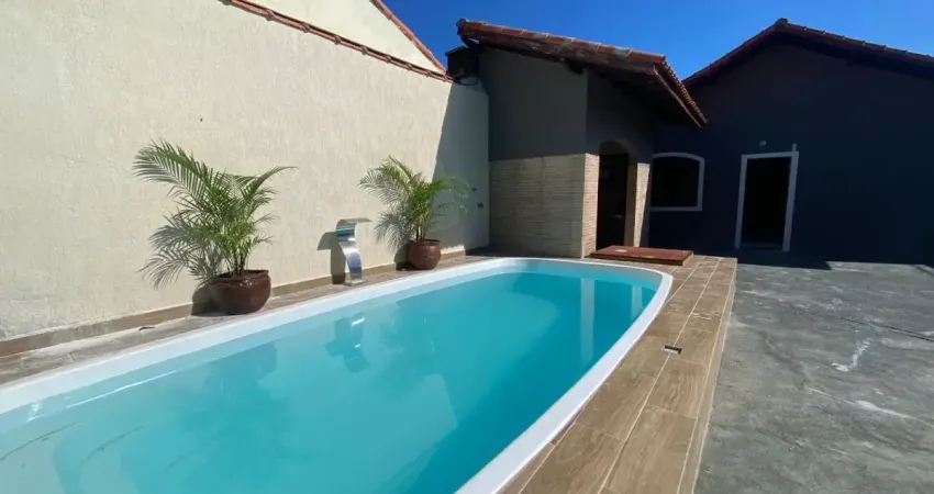 Casa na praia com 4 quartos, piscina e churrasqueira em itanhaém.