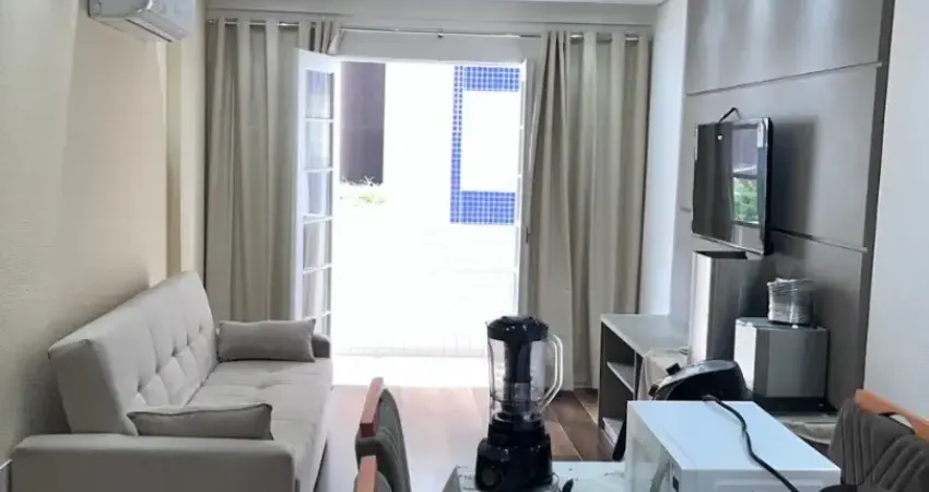 Lindo em predio frente ao mar 01 dormitório mobiliado finamente .