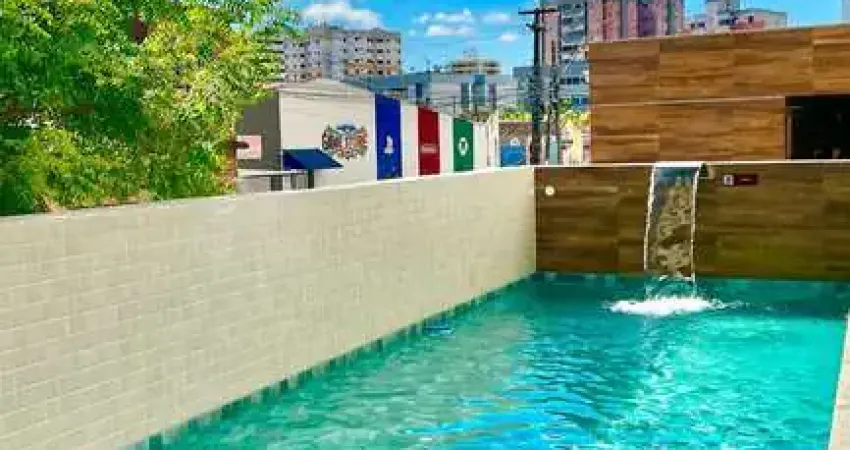 Apartamento novo com 2 quartos a poucos passos da praia 