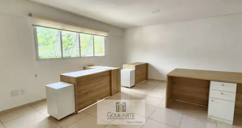 Sala comercial em prédio comercial na pitangueiras - guarujá/sp.