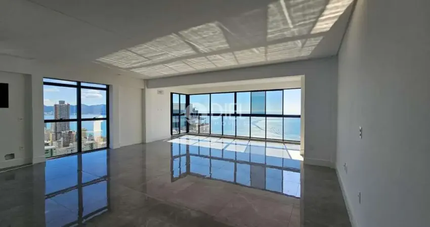 Frente para  avenida apto com 4 suítes e 3 vagas, meia praia, itapema - sc