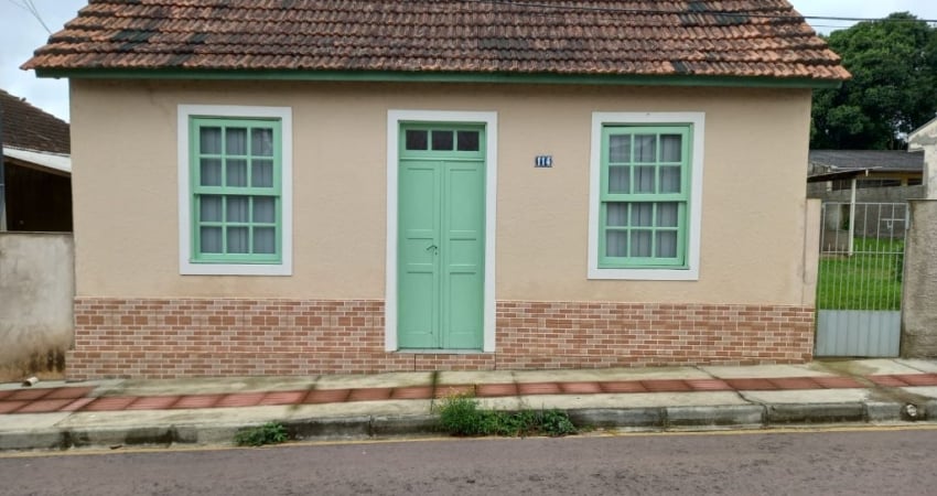 Terreno com casa na Vila do Rosario