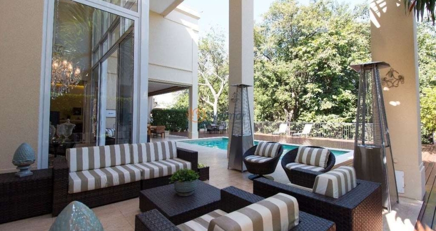 Oportunidade única! Casa de alto padrão em condomínio de luxo em Campinas-SP, com 4 suítes, 3 salas e 10 vagas de garagem.
