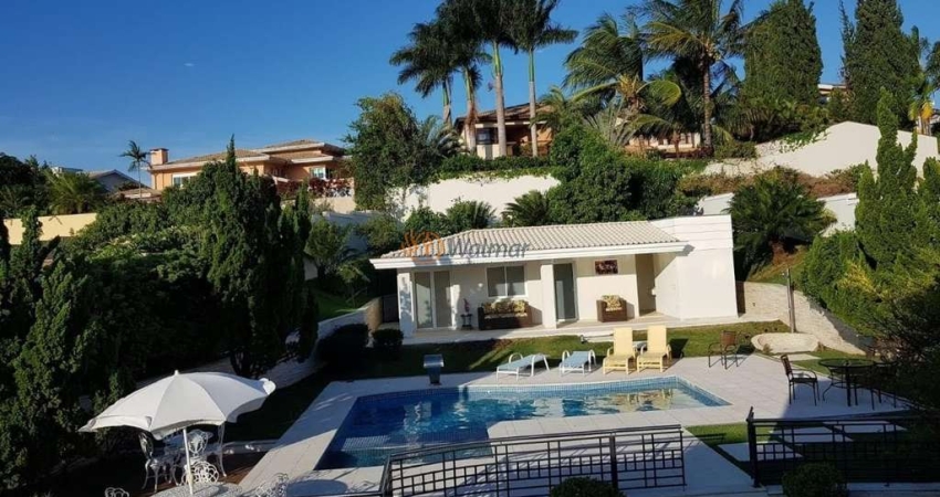 Espetacular mansão de alto padrão em condomínio de luxo em Alphaville Campinas, com 5 quartos, 5 suítes, 4 salas, 7 banheiros, 10 vagas de garagem e 732,76 m² de área. Venha conferir!