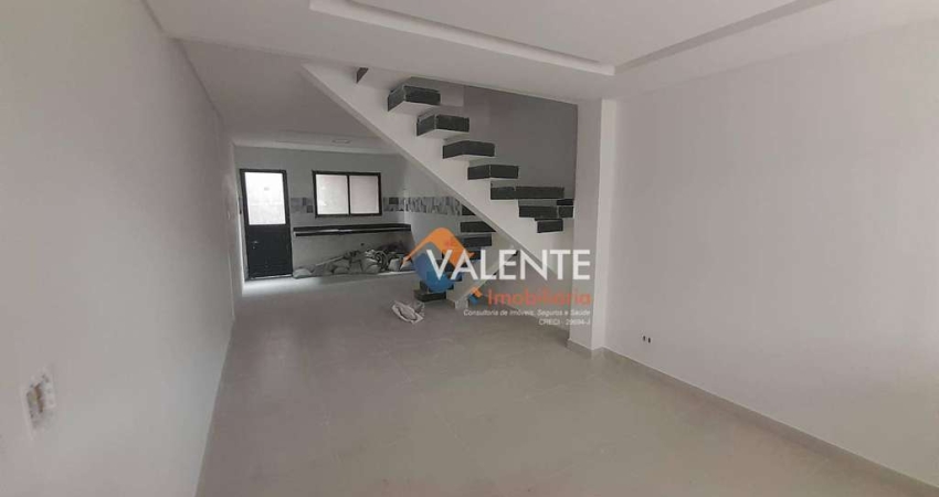 Sobrado com 3 dormitórios à venda, 108 m² por R$ 670.000,00 - Caiçara - Praia Grande/SP