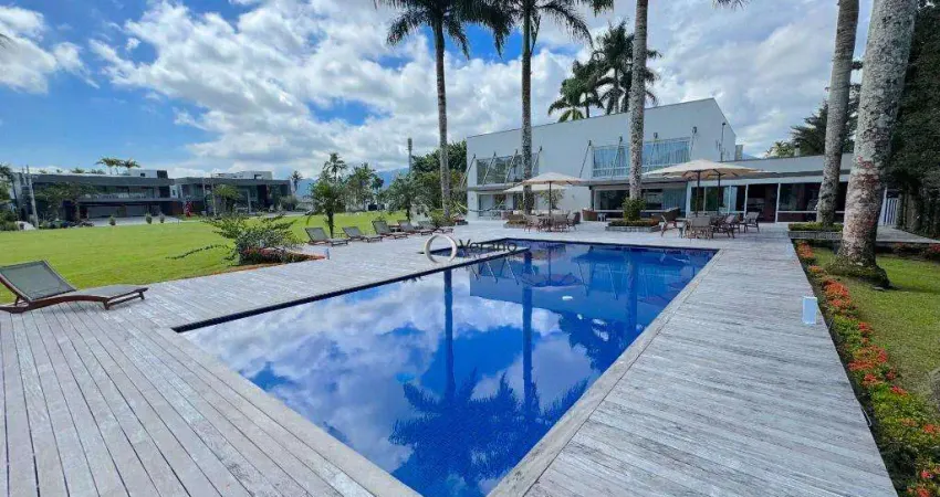 Casa a venda na marina guarujá com vaga para barcos de até 100 pés, piscina, espaço gourmet e 2 saunas