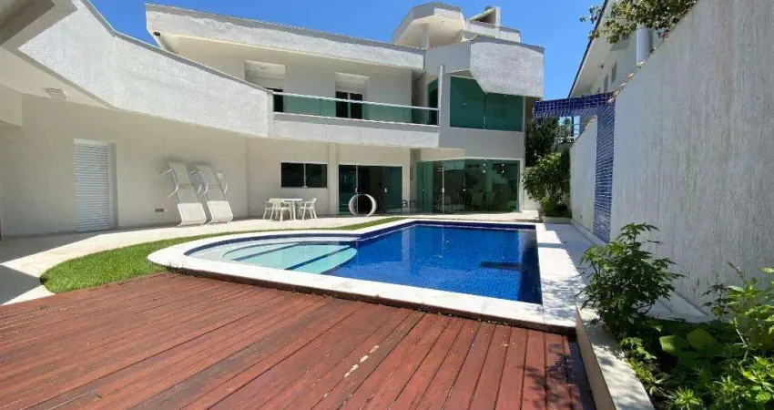 Casa em condomínio fechado com 5 suítes, piscina e area gourmet a poucos metros da praia do pernambuco - guarujá/sp