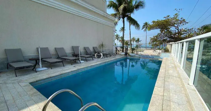 Casa com 4 suítes em comdominio fechado na praia da enseada,á poucos metros da praia