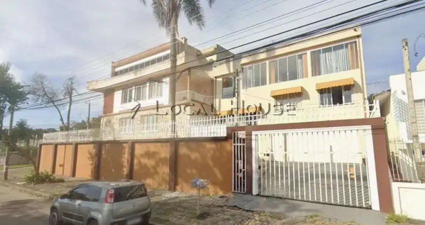 Casa residencial e comercial à venda no hugo lange – 3 pavimentos, vista panorâmica e espaços amplos.