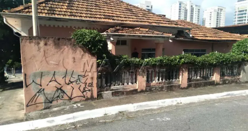 Terreno à venda com duas casas, 2 dormitórios, sala, cozinha, na Santa Teresinha.