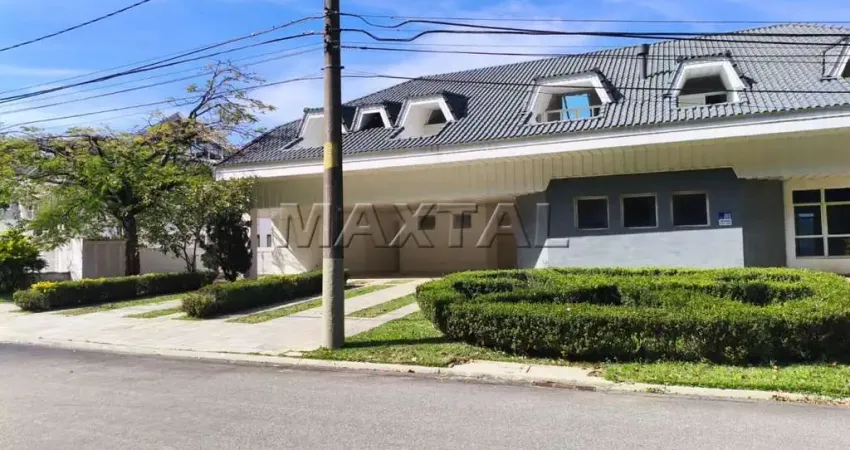 Casa alphavile de 1531,24 m², 7 quartos e 7 suites, salas, lareira, cozinha, elevador e 5 vagas.