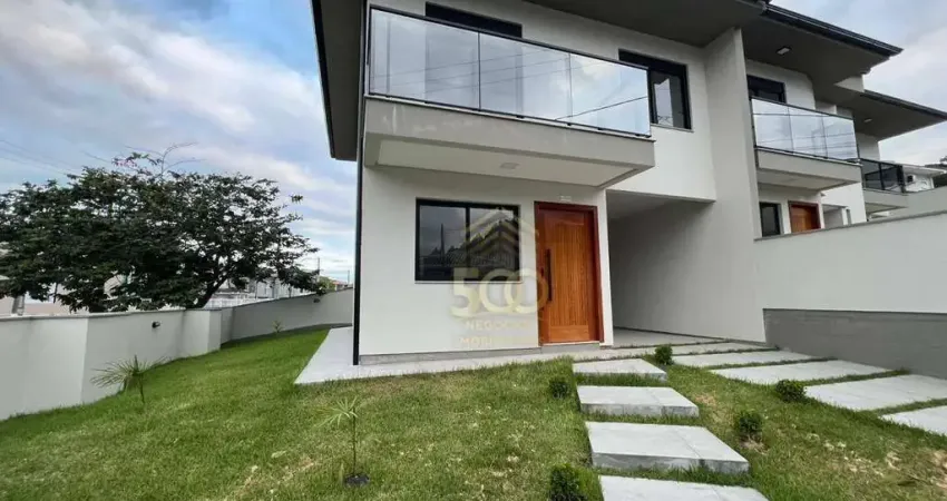 Sobrado à venda, 107 m² por R$ 649.000,00 - Potecas - São José/SC
