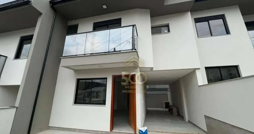 Sobrado à venda, 107 m² por R$ 549.000,00 - Potecas - São José/SC