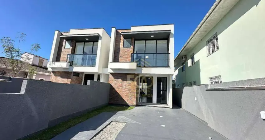 Sobrado com 3 dormitórios sendo uma suíte e duas demi-suíte à venda, 112 m² por R$ 690.000 - Areias - São José/SC