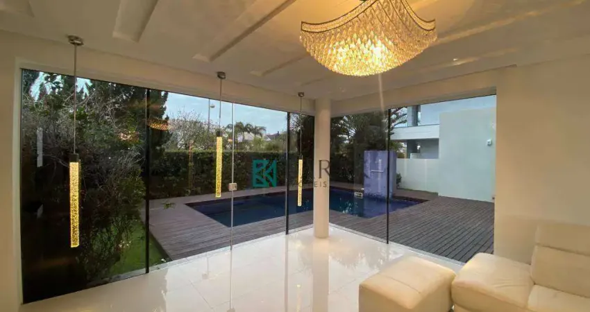 Casa com 4 dormitórios à venda, 588 m² por r$ 5.600.000,00 - jurerê internacional - florianópolis/sc