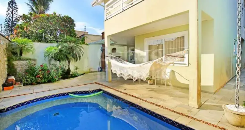 Casa à venda com piscina e 4 quartos em peruíbe, no bairro jardim ribamar