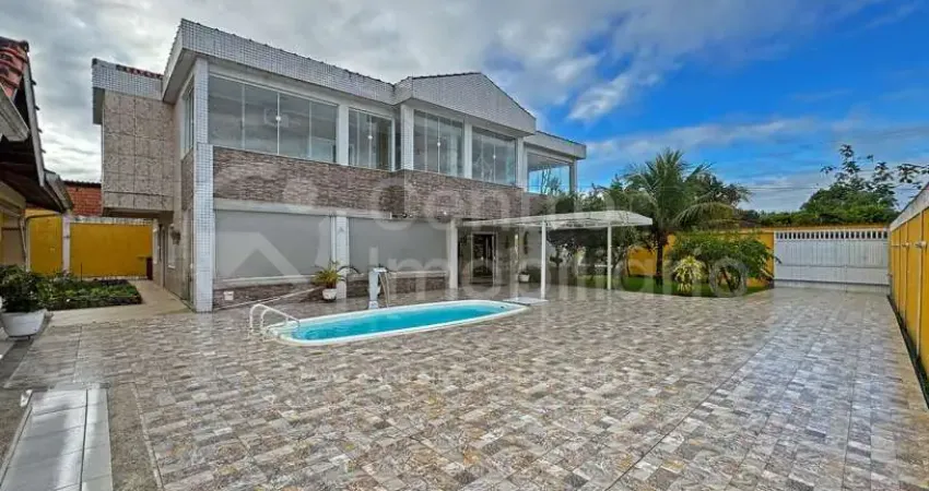 Casa à venda com piscina e 4 quartos em peruíbe, no bairro jardim sao luiz