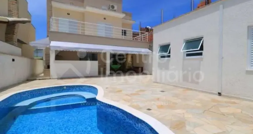 Casa à venda com piscina e 3 quartos em peruíbe, no bairro jd tres marias