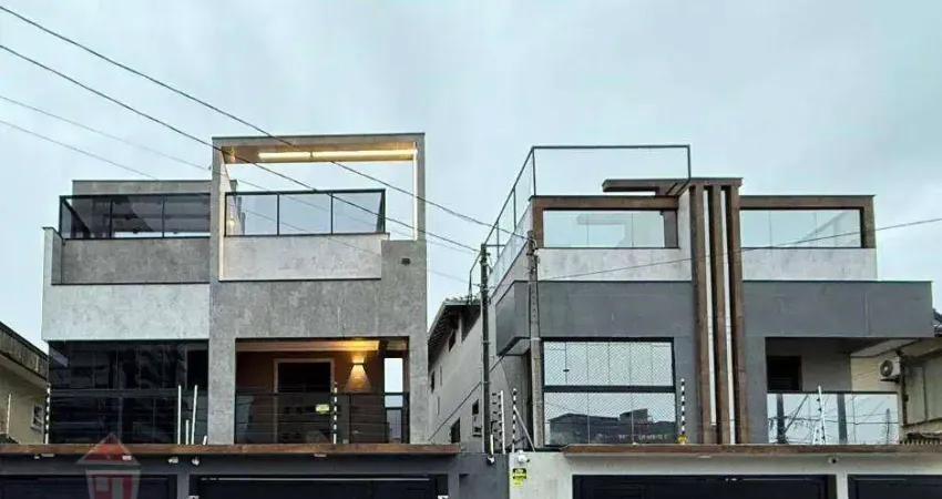Sobrado com 3 dormitórios à venda, 162 m² por R$ 1.480.000 -  Guilhermina - Praia Grande/SP