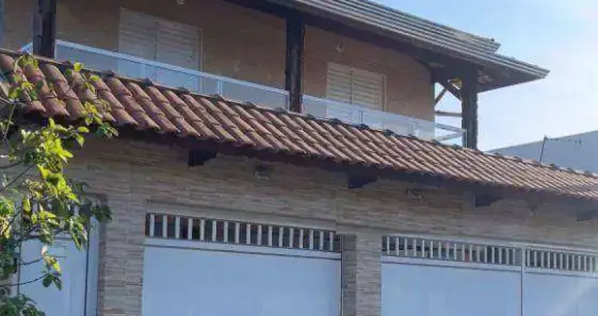 Casa de condomínio com 2 dormitórios à venda, 54 m² por R$ 270.000 - Maracanã - Praia Grande/SP